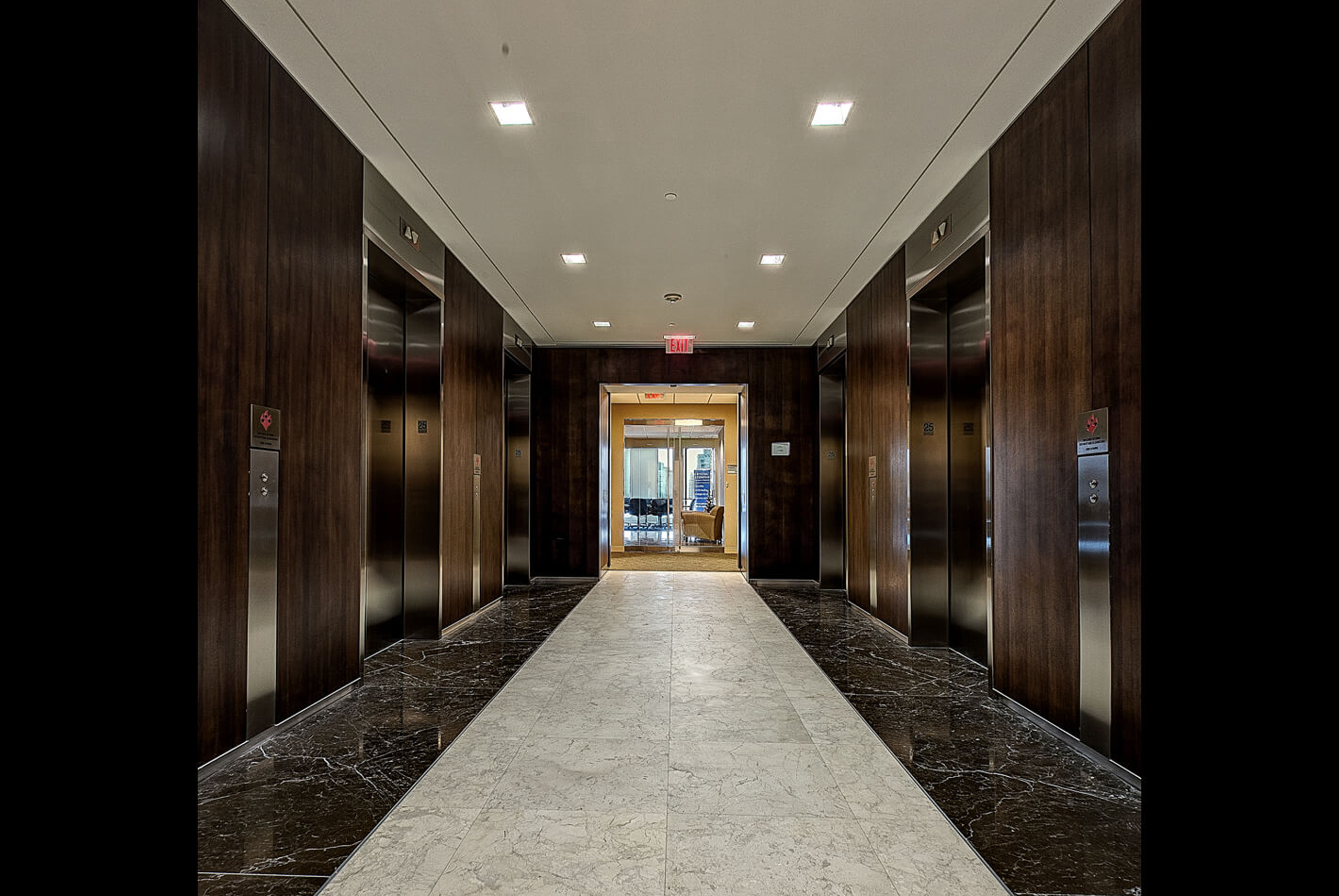 Commercial building elevator lobby maintained by Clark Elevator